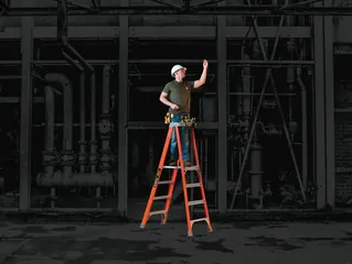 Tradesperson working hands-free on a Louisville Ladder platform ladder