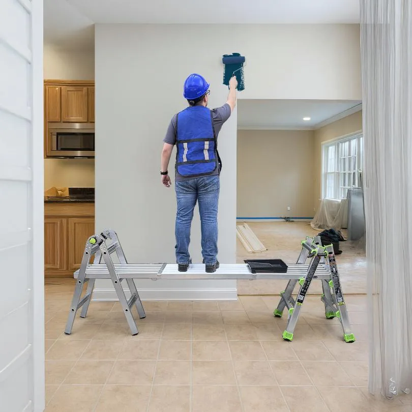 Louisville Ladder multipurpose ladder set up as a scaffold with a plank platform for painting